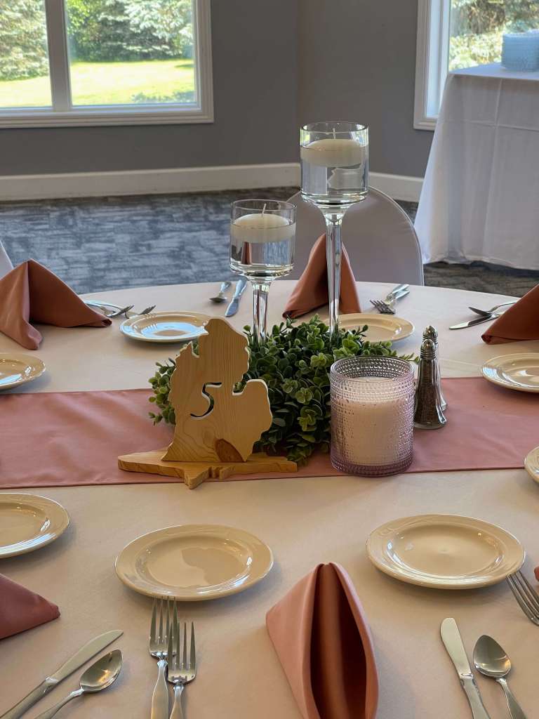 close up of pink banquet table settings