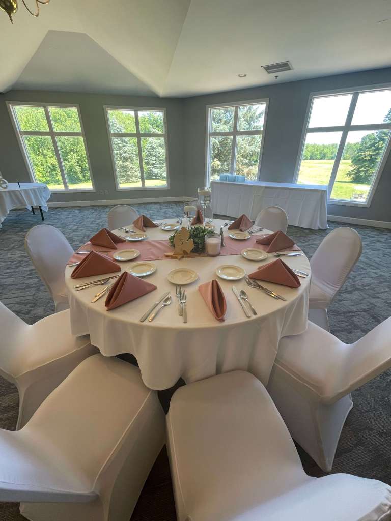 pink banquet napkins with pink table runner on banquet table