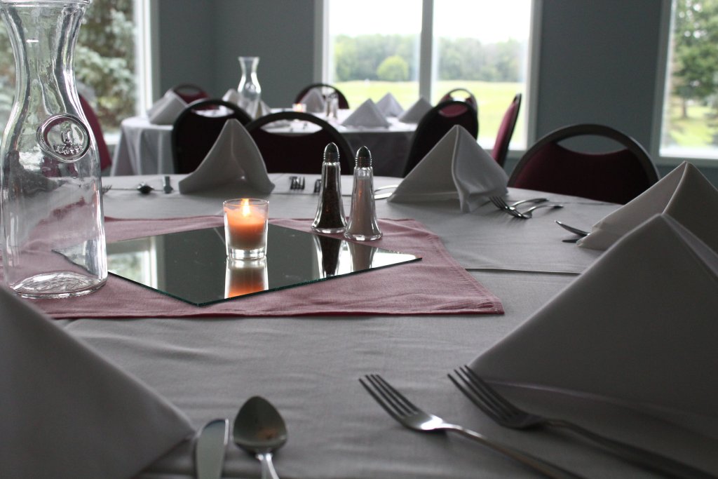 close up of banquet table with pink accents